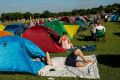 Tent city: Tennis fans queue by their tents in the public queueing zone outside the All England Tennis Club at Wimbledon.