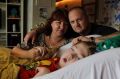 Jo-ann and Michael Morris with their son, Samuel, in 2013 when he was in palliative care at Bear Cottage in Manly, Sydney.