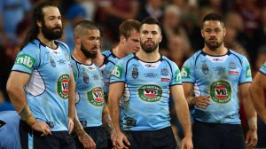 Blues players look dejected after a Maroons try during game three of the State Of Origin.