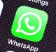 The Whatsapp app logo on an iPhone. 