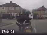 This is the moment a moped rider rams his bike into the front of a car in an apparent scam