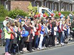 Family and friends in 'Bradley forever' football shirts carried the youngster's coffin into St Joseph's Church, as superheros saluted. His coffin was decorated with the Stadium of Light, the football ground at which he was a mascot in the final months