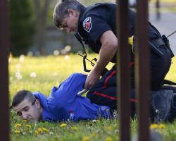 News videographer Jeremy Cohn, tackled and arrested by Hamilton Police on May 16, 2017. Image: Barry Gray. Used with permission.