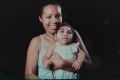 Tatiane do Nascimento holds her son Willamis Silva, who was born with microcephaly, as a result of his mother's Zika ...