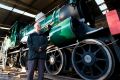 Bruce Blain with the locomotive which brought the first train to Canberra. The Braddon Forum has called on the ...
