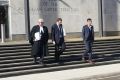 Kerim Hidic, 22, (far right) leaves the ACT Supreme Court with his lawyers after a jury found him guilty of recklessly ...
