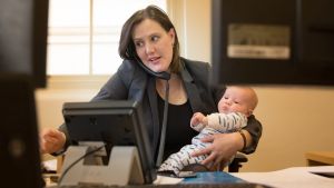 Kelly O'Dwyer at work with her son Edward.