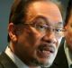 Then Malaysian opposition leader Anwar Ibrahim, left, with Australian senator Nick Xenophon in Jakarta.