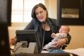 Kelly O'Dwyer at work with her son Edward.