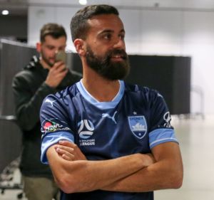 Global reach: Alex Brosque and Petr Cech, at the Puma kit launch for Sydney FC and Arsenal. 