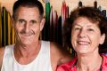 Maria and Jim White with their Canberra Times fun run medals, along with Jims kermit the frog fun run costume. Maria and ...