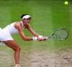 Garbine Muguruza plays a backhand in a winning shot against Venus Williams.