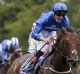 Maiden group 1 win: Adam Kirby steers Harry's Angel (left) to victory in The Darley July Cup Stakes at Newmarket.