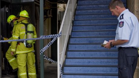 Fire crews and police investigate the alleged arson at the Brierly Street cafe in Weston in March 2014.