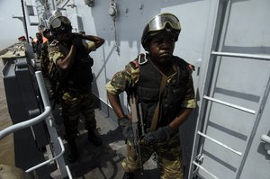 Cameroonian Navy Sailors board the French Frgates de surveillance FS Germinal F735 while performing a visit, board, search and seizure drill (VBSS) in Douala, Cameroon, during exercise RECAMP V.