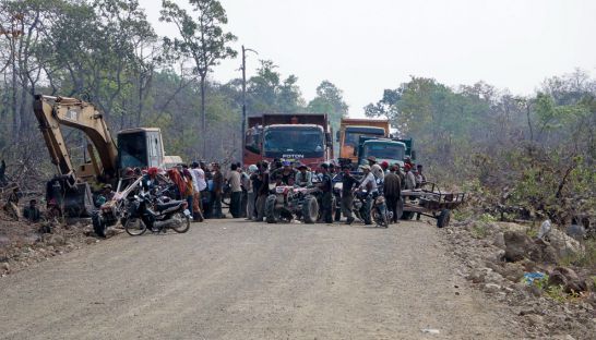 Ethnic Kuoy villagers in Preah Vihear province block Rui Feng trucks and machinery from travelling along a road earlier this week. Photo supplied