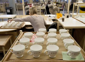 In this Monday, March 13, 2017 photo, a view of tea cups on production line at Wedgwood factory, in Stoke on Trent, England. Wedgwood has embarked on a sweeping revamp of its offerings to broaden its international market.