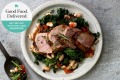 The rich roast pork goes well with the kale and white beans. 