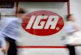 The company, which supplies groceries to IGA supermarkets, reported net profit of $171.9 million for the year ending ...