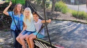 Vivienne Pearson and her two children, with the trampoline that cost them more than $4000, including accessories and ...