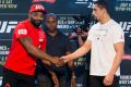 Nothing but respect: Yoel Romero, left, and Robert Whittaker shake hands before their fight at UFC 213.