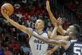 Dante Exum (left) picked up 18 points for Utah Jazz against San Antonio in their NBA summer league game in Salt Lake City.