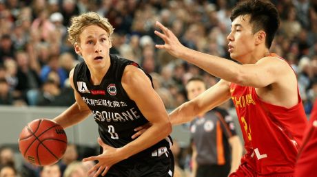 Drive way: Melbourne United's Kyle Adnam head to the basket.