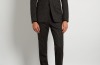 <b>Givenchy</b><br>
Diverging from the traditional blacks and charcoals, this flecked wool suit by Givenchy is a sleek ...