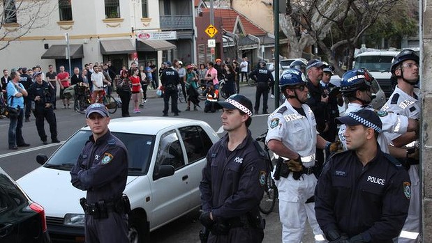 Police on the lookout at the Hat Factory eviction on Thursday afternoon.