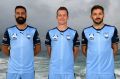 Blank canvas: Alex Brosque, Brandon O'Neill and Milos Ninkovic model the sponsor-less kit.