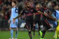 Gun debut: Alexandre Lacazette celebrates his first goal in an Arsenal jersey, against Sydney FC at ANZ Stadium on ...