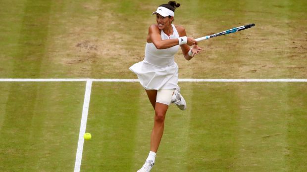 Unrelenting: Garbine Muguruza during the final against Williams.