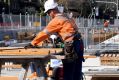 Construction workers at a stop for the light rail line on Wansey Road near Randwick Racecourse.