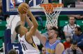 Utah Jazz guard Dante Exum (11) takes to the basket.