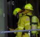 Fire crews and police investigate the fire at the Brierly Street cafe in Weston in March 2014.