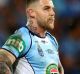 BRISBANE, AUSTRALIA - JULY 12: Josh Dugan of the Blues looks on during game three of the State Of Origin series between ...