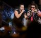 Singers Luis Fonsi, left and Daddy Yankee perform during the Latin Billboard Awards in Coral Gables, Fla.