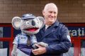 In their final appearance together on Tuesday, Constable Kenny Koala greets students at Ngunnawal Primary School with ...