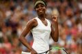 Thrilled: Venus Williams celebrates her win over Jelena Ostapenko at Wimbledon.