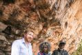 Associate Professor Chris Clarkson with traditional owners May Nango and Mark Djanjomerr. 