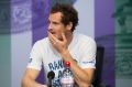 Britain's Andy Murray at a press conference after losing his Men's Singles Quarterfinal Match against Sam Querrey of the ...
