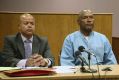 OJ Simpson with his attorney, Malcolm LaVergne, left, appearing via video for his parole hearing.