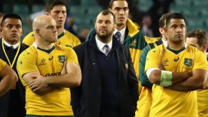 SYDNEY, AUSTRALIA - JUNE 25: Wallabies coach Michael Cheika and Wallabies players look dejected after losing the ...