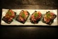 Diced tuna and kingfish on thick nori and sesame seed crisps. 