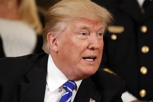 President Donald Trump speaks before signing bills in the Diplomatic Reception Room at the White House, Friday, June 2, 2017