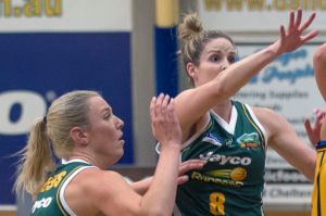 Sara Blicavs and Steph Cumming in action for the Dandenong Rangers.