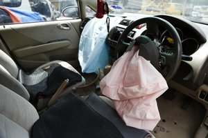 In this Nov. 7, 2016 photo, Rabiah's Honda City steering wheel with exploded air bag. Slim River, Malaysia. The April 16, 2016 accident in eastern Sabah state claimed the second victim in Malaysia, associated with one of the world’s largest auto recall due to defective air bags made by Japanese auto supplier Takata. The air bag was later linked to three more deaths in the country, making it a total of five deaths in Malaysia. (AP Photo/Lim Huey Teng)