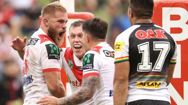 Workhorse: Jack De Belin celebrates his try in round one.