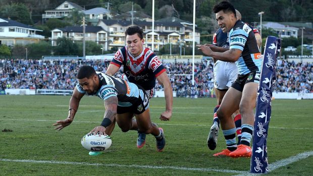 Sharks frenzy: Ricky Leutele crosses over for Cronulla.