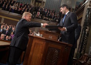 Trump shaking hands with Paul Ryan